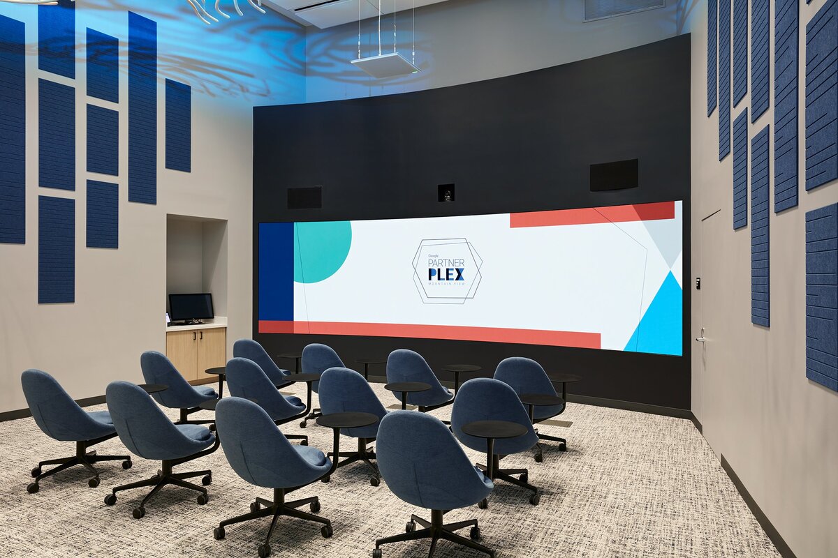 Partner Plex classroom with environmental graphics and digital wayfinding